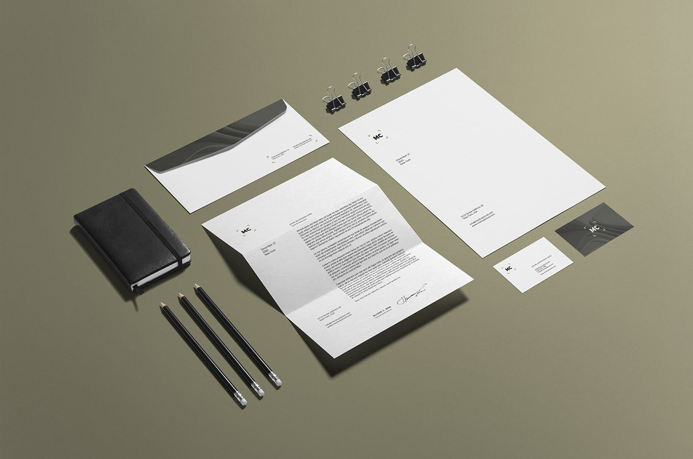 Clean design mockup of business stationery, notebook, pencils and clips