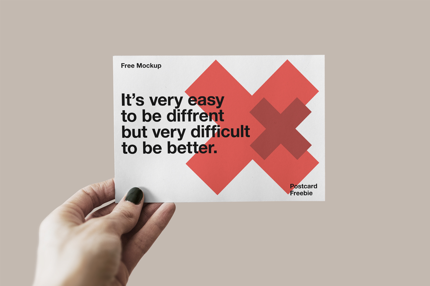 Design mockup of hand holding postcard